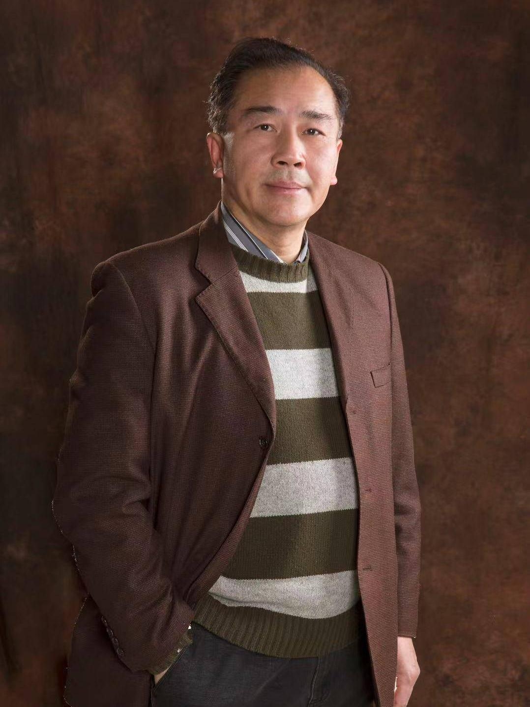 忻平